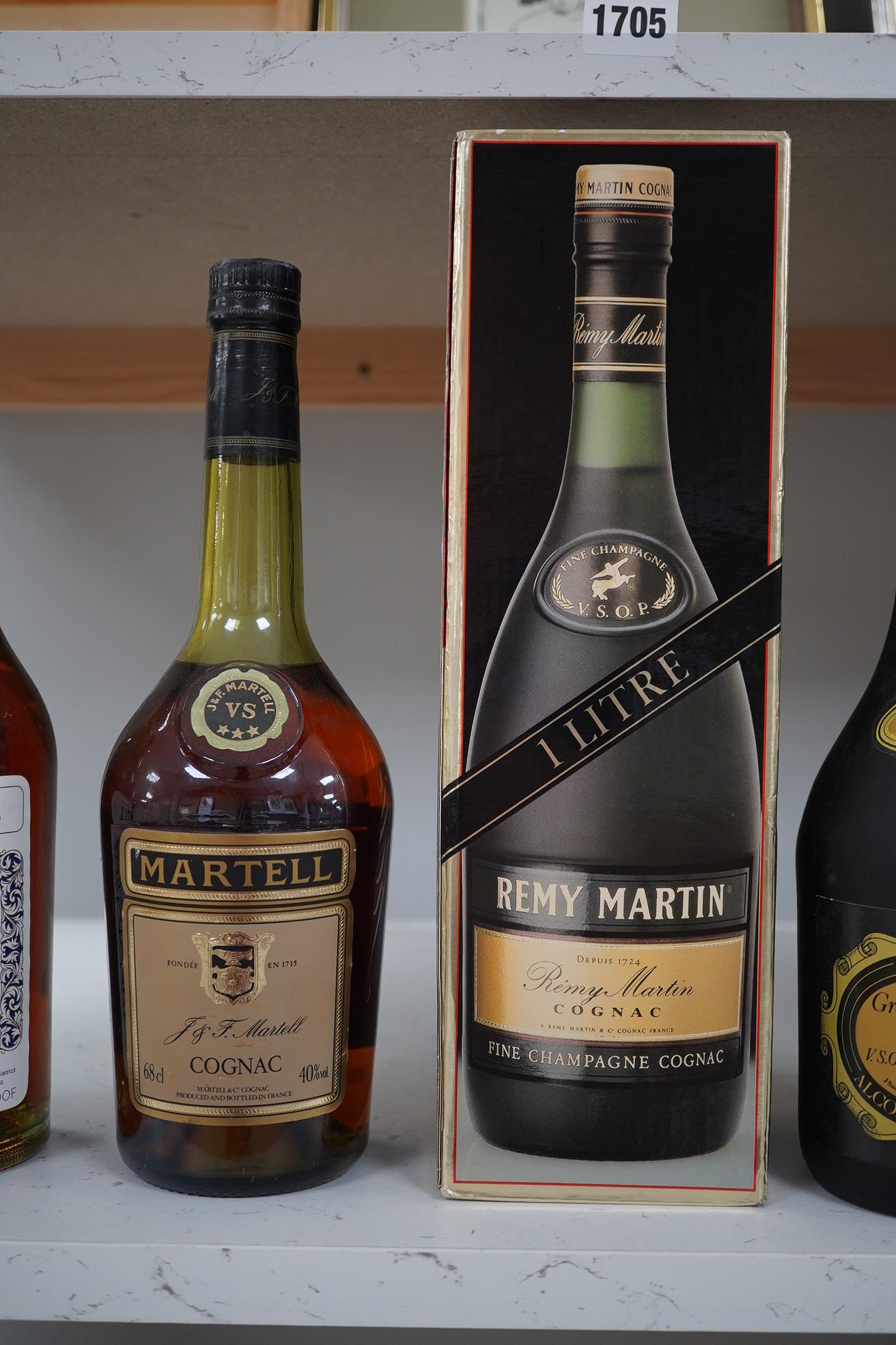 Seven various bottles of cognac to include a boxed bottle of Remy Martin, Courvoisier. Condition - unknown how stored